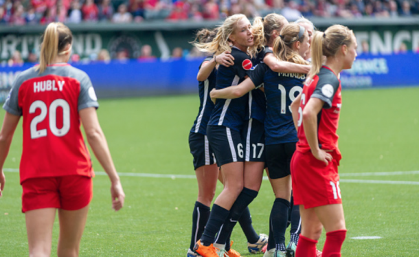 Seattle Reign FC celebrate a goal first match of the season. Seattle would go on to win 3-2. (Photo by Diego Diaz/Icon Sportswire via Getty Images)