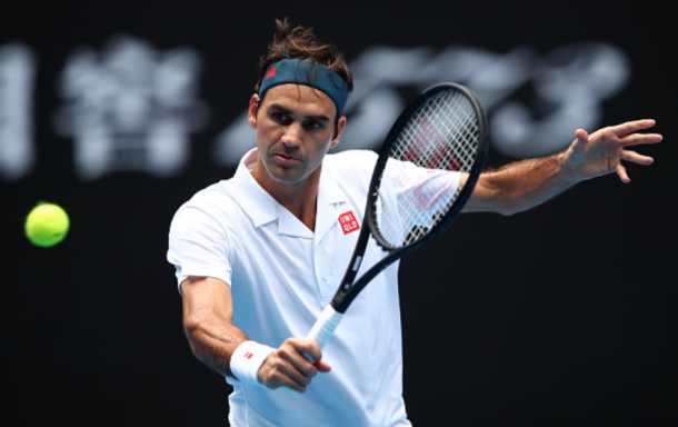 Federer was seen at the net often in this match (Cameron Spencer/Getty Images)