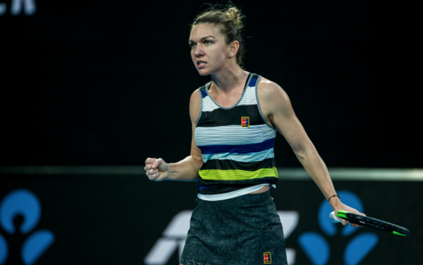 Halep celebrates winning the second set against Serena (Icon Sportswire/Getty Images)