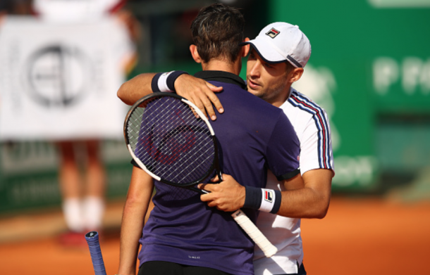 Lajovic and Thiem hug at the net after their match (Clive Brunskill/Getty Images)