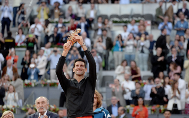 Djokovic celebrates winning the Madrid title (NurPhoto/Getty Images)