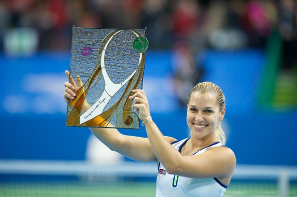 Cibulkova lifts the Katowice Open trophy. Photo credit: Gallao Images/Getty Images.