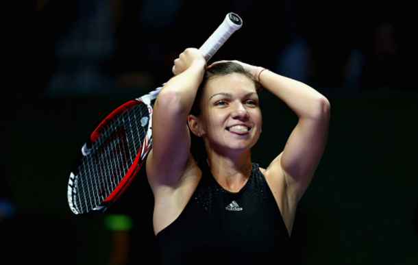 Simona Halep celebrating her victory against Serena Williams in their round robin match | Photo: Clive Brunskill / Getty Image