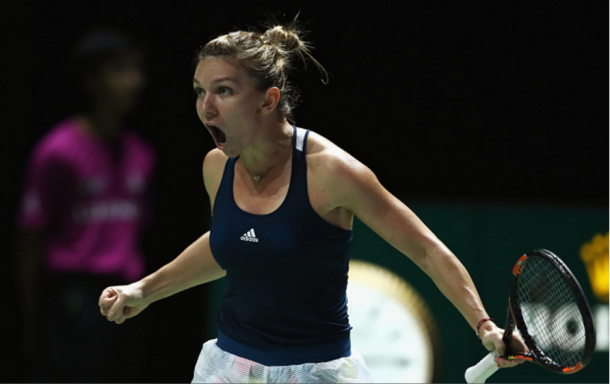 Simona Halep exploding with joy after wining a point | Photo: Julian Finney/ Getty Images