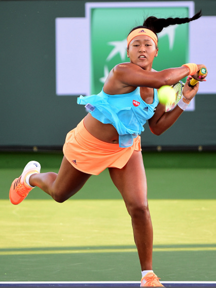 Naomi Osaka in her first round match against Risa Ozaki | Photo: harry How / Getty Images