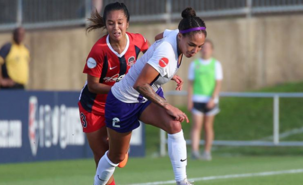 Orlando forward Sydney Leroux shields the ball from Washington defender Caprice Dydasco. | Photo: isiphotos.com