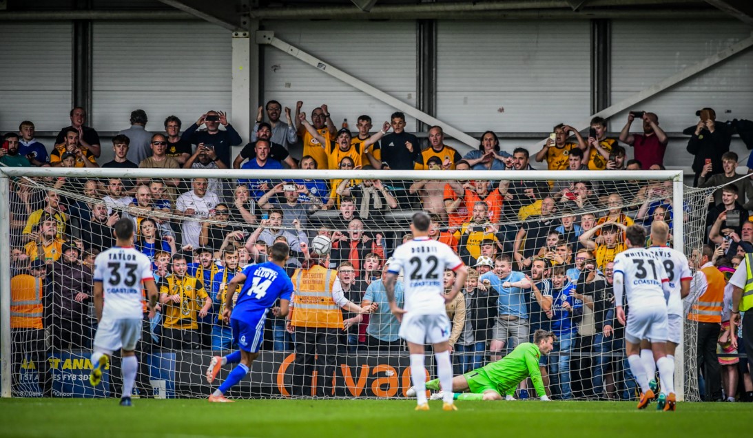 Danny Elliott buries his decisive penalty against Fylde (Photo: AFC Fylde)