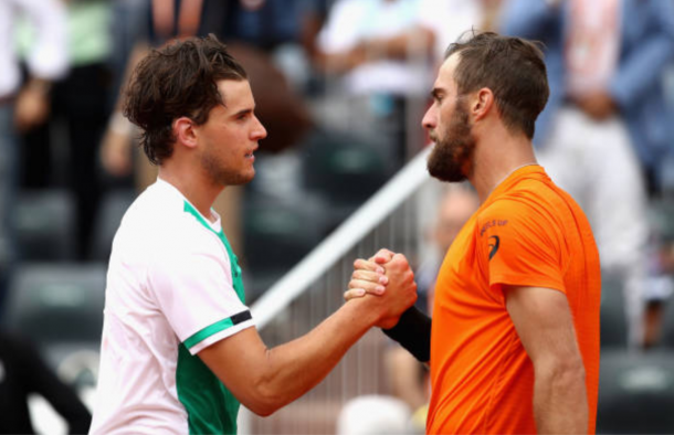 Dominic Thiem showing tremendous sportsmanship at the net to Steve Johnson (Photo: Julien Finney/Getty Images)