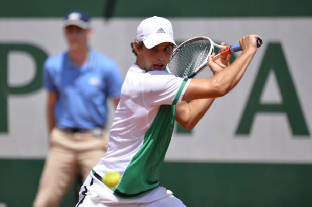 Dominic Thiem goes for a return (Photo: Aurelien Meunier/Getty Images)