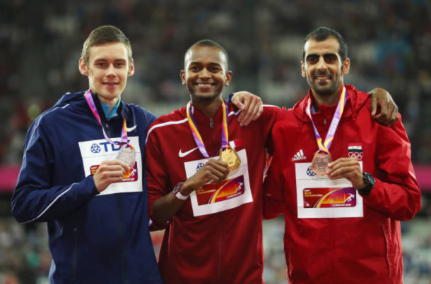 The three medalists Mutaz Essa Barshim, Danilo Lysenko and Majededdin Ghezal pose for pictures on the podium (Photo: Richard Heathcote/Getty Images)