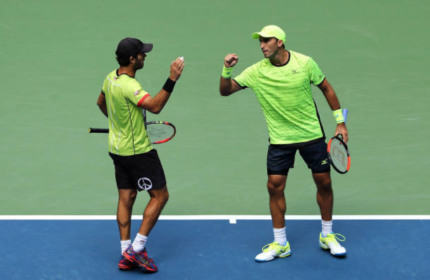 Jean-Julien Rojer and Horia Tecau celebrate putting away match point (Photo: Elsa/Getty Images)