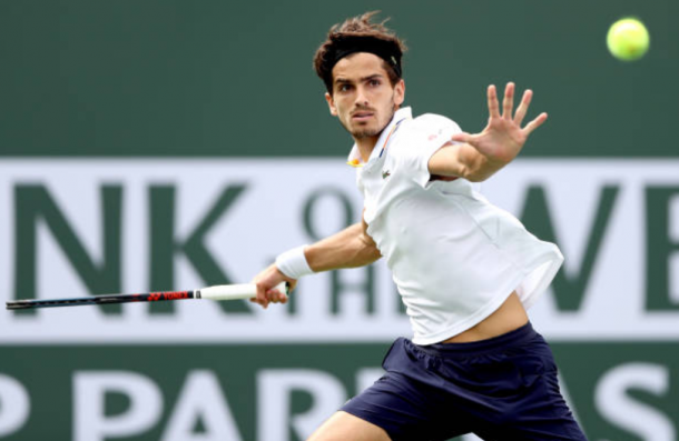 Pierre-Hugues Herbert gears up to strike a forehand shot (Photo: Matthew Stockman/Getty Images)