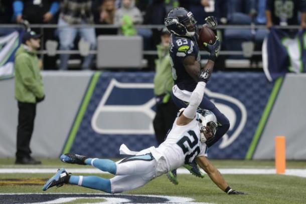 Seattle Seahawks receiver Ricardo Lockette makes a touchdown catch in a game against the Carolina Panthers. Image via Stephen Brashear/AP