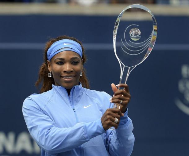 Serena Williams holds her trophy after winning the Rogers Cup in 2013. Photo: Richard Lautens/Toronto Star
