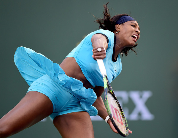 Serena Williams serves during her straight set victory over Kateryna Bondarenko of Ukraine at Indian Wells Tennis Garden on March 15, 2016 in Indian Wells, California. | Photo: Harry How/Getty Images North America