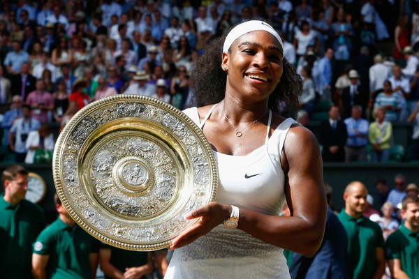 Serena Williams posing with the Venus Rosewater Dish after defeating Garbine Muguruza in last year's Wimbledon final. Photo credit : Julian Finney / Getty Images.