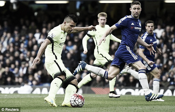 Above: Sergio Aguero scoring his second in Chelsea's 2-0 defeat to Manchester City 