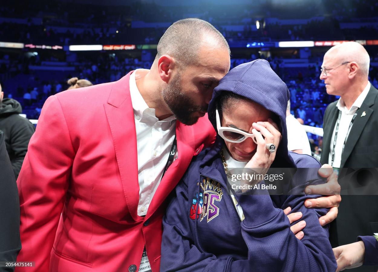 HATO REY, PUERTO RICO - MARCH 02: Amanda Serrano reacts as she leaves the ring with Most Valuable Promotions CEO Nakisa Bidarian after her fight was cancelled against Nina Meinke for Serrano's IBF, WBO and WBA featherweight women's titles at Coliseo de <strong><a  data-cke-saved-href='https://www.vavel.com/en-us/more-sports/2024/02/20/boxing/1173234-oshaquie-foster-defends-wbc-junior-lightweight-title-against-abraham-nova-following-split-decision-win.html' href='https://www.vavel.com/en-us/more-sports/2024/02/20/boxing/1173234-oshaquie-foster-defends-wbc-junior-lightweight-title-against-abraham-nova-following-split-decision-win.html'>Puerto Rico</a></strong> on March 02, 2024 in Hato Rey, <strong><a  data-cke-saved-href='https://www.vavel.com/en-us/more-sports/2024/02/20/boxing/1173234-oshaquie-foster-defends-wbc-junior-lightweight-title-against-abraham-nova-following-split-decision-win.html' href='https://www.vavel.com/en-us/more-sports/2024/02/20/boxing/1173234-oshaquie-foster-defends-wbc-junior-lightweight-title-against-abraham-nova-following-split-decision-win.html'>Puerto Rico</a></strong>. Serrano was declared medically unfit to fight by the Puerto rican boxing commision after sustaining an eye injury yesterday. (Photo by Al Bello/Getty Images)