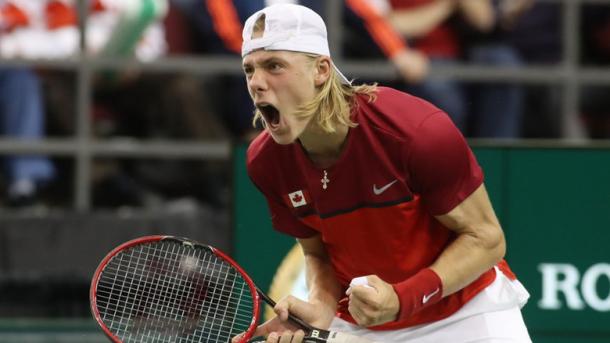 Denis Shapovalov celebrates during a win during last year's World Group Playoffs, where he won two rubbers. Photo: Lars Hagberg/AFP/Getty Images