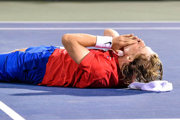 Shapovalov fell to the court in shock after beating Nadal. Photo: Minas Panagiotakis/Getty Images