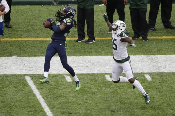 Richard Sherman intercepting his first pass of the season against the New York Jets | Source: Peter Morgan - AP Photo