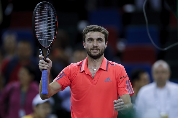 Gilles Simon celebrates his win over Jack Sock. Photo: Lintao Zhang/Getty Images