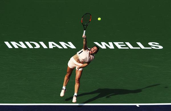 Photo Source: Adam Pretty/Getty Images North America-Simona Halep served her way out of trouble.