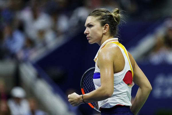 Simona Halep celebrates after winning a point during her first-round match against Maria Sharapova at the 2017 U.S. Open. | Photo: Elsa/Getty Images