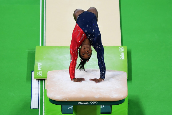 Simone Biles performs on vault during qualifications at the Rio 2016 Olympic Games/Getty Images