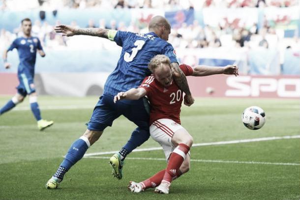 Skrtel was lucky to remain on the found following his foul on Jonny Williams (image: irishmirror.ie)