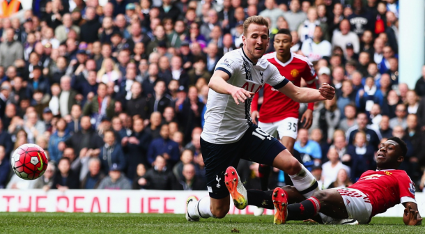 Timothy Fosu-Mensah makes a critical tackle against Harry Kane. | Source: Clive Rose/Getty Images