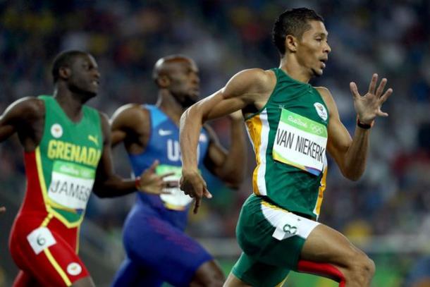 Wayde Van Niekerk holding off Kirani James and LaShawn Merritt to win the 400 meters in Rio/Photo Source: Getty Images