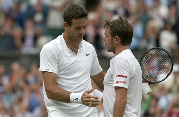Juan Martin del Potro and Stan Wawrinka meet at the net after their Wimbledon clash (Camera Sport/Stephen White)
