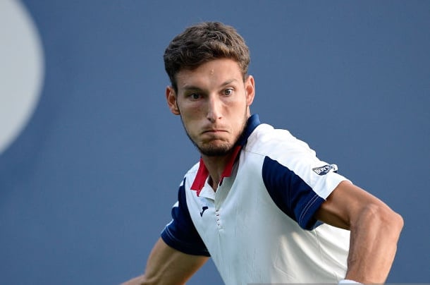 Photo: Steven Ryan/Getty Images-Carreno Busta hits a forehand winner.