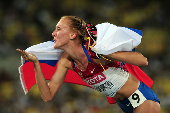 Yulia Zaripova celebrates her 2011 World Championships gold, which she has now been stripped of (Getty/Stu Forster)