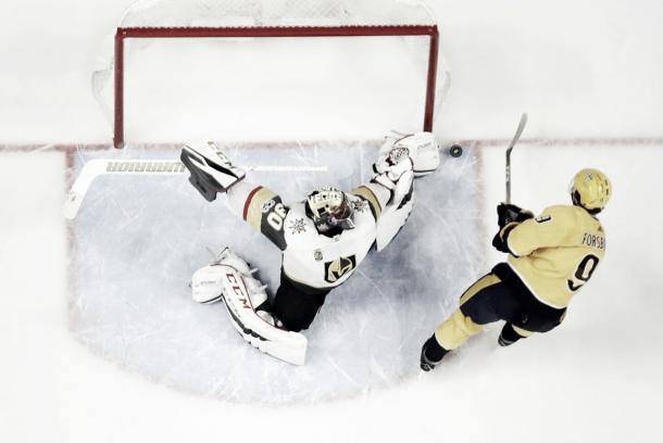 Malcolm Subban stretches out for a save vs the Predators' Filip Forsberg. (AP Photo/Mark Humphrey)