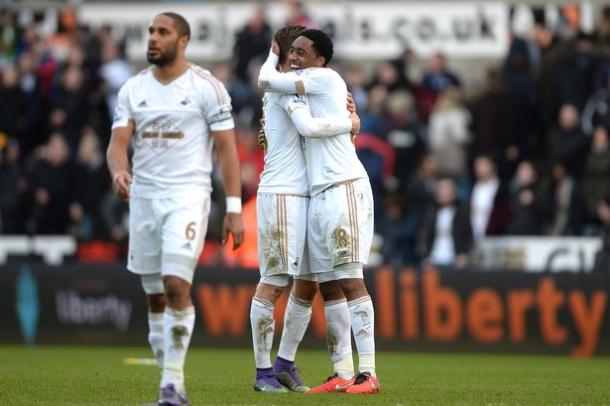 Leroy Fer (right) has been enjoying his time in South Wales. (Photo: Huw Evans Picture Agency)