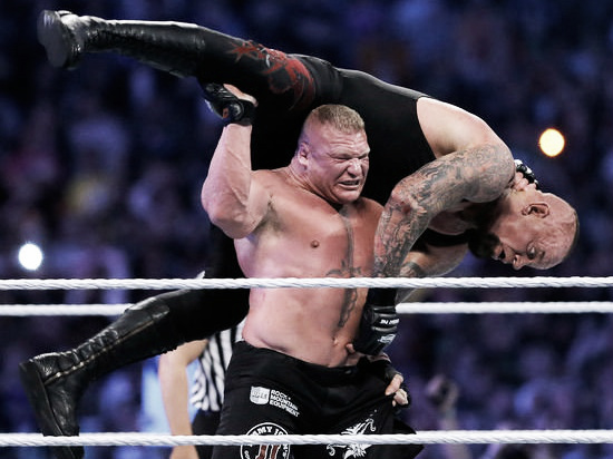 Taker up for the F-5 (WWE.com)
