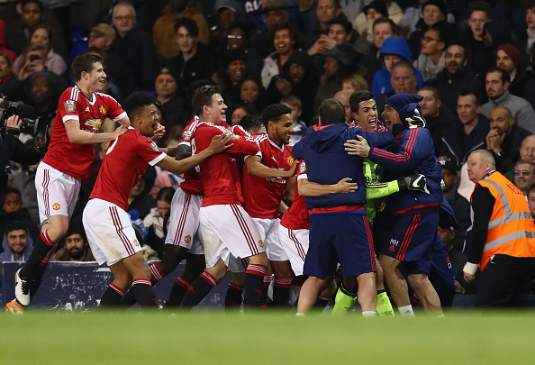 Joel Pereira and his teammates celebrate after Varela's goal | Photo: Julian Finney/Getty Images