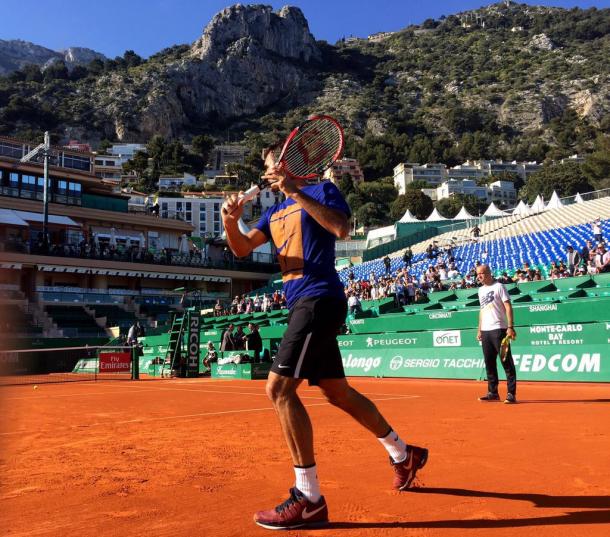 Federer shared this photo of him practicing with his fans, writing, "Tennis with a view." Credit: Roger Federer/Twitter