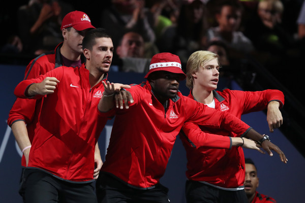 Photo Source: Julian Finney/Getty Images Europe-John Isner, Thanasi Kokkinakis, Frances Tiafoe and Denis Shapovalov cheer on their teammate during a Laver Cup match.