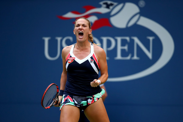 Timea Babos celebrates after winning a point during her second-round match against Maria Sharapova at the 2017 U.S. Open. | Photo: Clive Brunskill/Getty Images