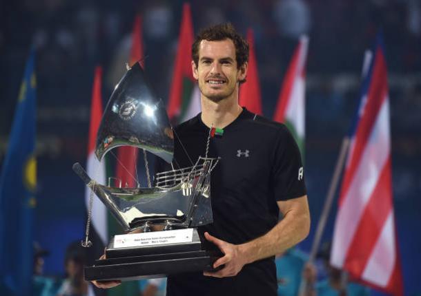 Andy Murray poses with the title after winning in Dubai (Getty/Tom Dulat)