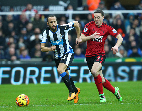 Andros Townsend taking on James Chester at St. James' Park | Photo: Getty