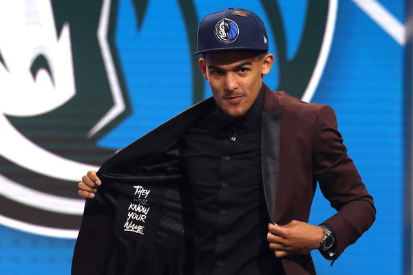 Trae Young reacts after being drafted fifth overall by the Dallas Mavericks during the 2018 NBA Draft |Mike Stobe/Getty Images North America|