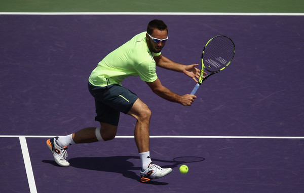 Viktor Troicki prepares for a low backhand during his second round loss. Photo: Julian Finney/Getty Images