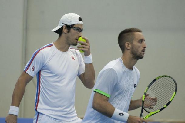 Ilija Bozoljac (left) serves alongside Viktor Troicki (Photo: Garanti Koza Sofia Open)