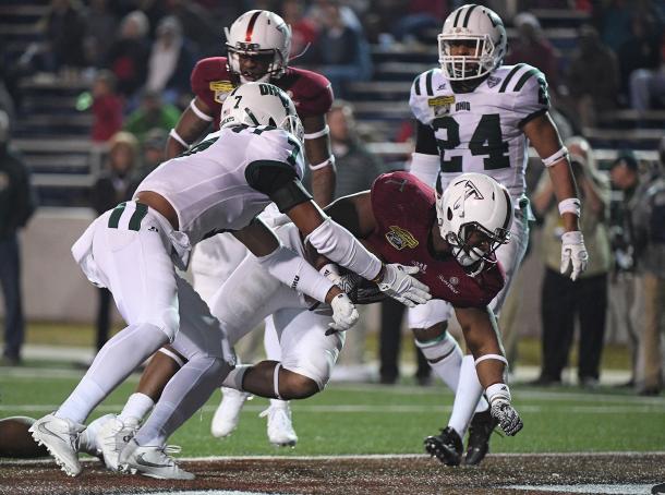 Jordan Chunn scores one of his three short touchdown runs during the Dollar General Bowl in Mobile. Photo: 