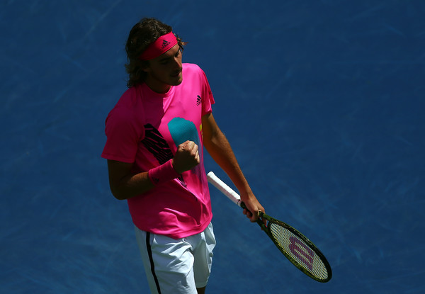 Tsitsipas pumps his fist during his comeback win. Photo: Getty Images