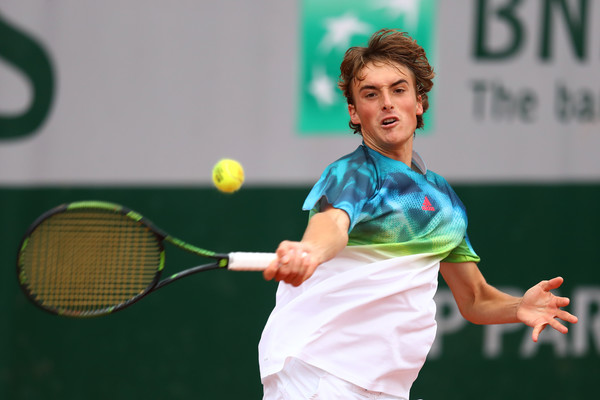 Stefano Tsitsipas hits a forehand during his first round match. Photo: Julian Finney/Getty Images